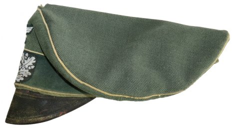 Salty Wehrmacht visor hat with traces of heavy frontline use