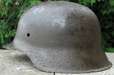 German M 45 Helmet without the ventilation holes. Rare.