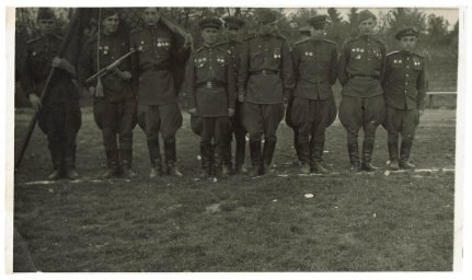 Officers of the guards unit with a red banner