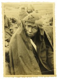 1941 year. Soviet POW in Budyonovka (cloth helmet)