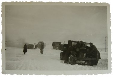 Wehrmacht technicians inspect abandoned Soviet truck GAZ-AA " Polutorka "