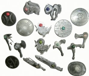 Set of German 3rd Reich WHW badges,Germanic weapons and Archaeology artifacts