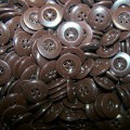 Brown plastic buttons 17-18 mm